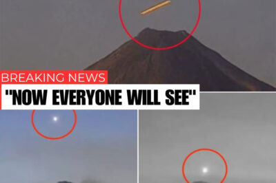 Multiple glowing UFOs shoot from the volcano’s mouth