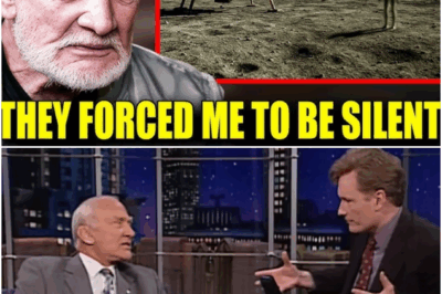The room snapped into absolute silence the moment Buzz Aldrin paused — not the slow kind, the “wait… did he really just go there?” kind. At ninety-five, the man who walked on the Moon stared past the audience like he was watching something replay across the decades. His grip tightened around the microphone, and in a low, uneven whisper he said, “We weren’t alone up there… not that night.” The host froze. A camera operator actually lowered his rig. It felt like history holding its breath.
